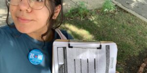 Sandra poses with lit during our first community canvass of 2024.